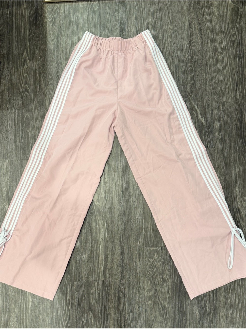 Pink Track Pants with White Side Stripes and Bow Hemming